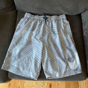 Men’s Nike grey bathing suit, size medium.